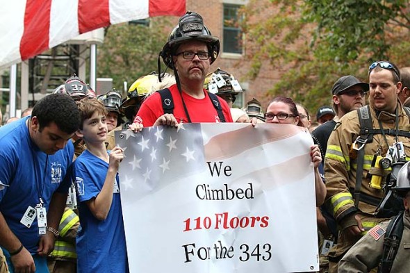 MTFR personnel, Jason Powell, stood at attention during the opening ceremony at the 2015 9/11 Stair Climb. (Submitted photo by Patrick O'Reilly)