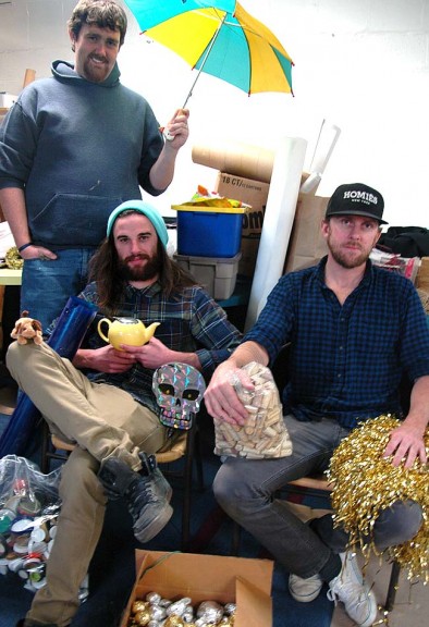 Nathan Foley, top with umbrella, Brandon Lowery, holding teapot, and Jesse Thayer, with pompom, are the artists who were locked up in the Arts Council Gallery for three days this week during Locked In: A Creative Collaboration. A reception for the project takes place Friday, Nov. 13, from 6–9 p.m. at the gallery, where the artists will speak about their experience at 7 that night. (photo by Diane Chiddister)