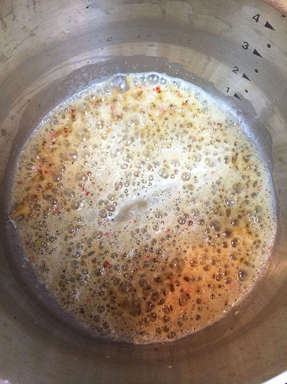 cooking aromatics into a bubbly froth