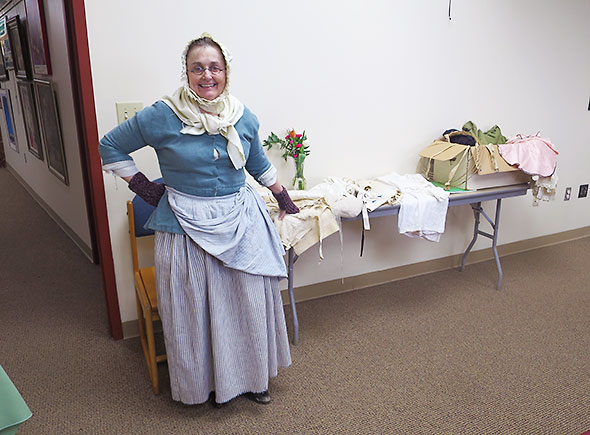 re-enactor Ann Armstrong presents the underpinnings of 18th century dress