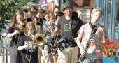 Friends Music Camp campers marched through town to promote their annual concert in 2014. This year’s concert is Saturday, July 30, at 7:30 p.m. in the Antioch College Foundry Theater. (News archive photo by Matt Minde)