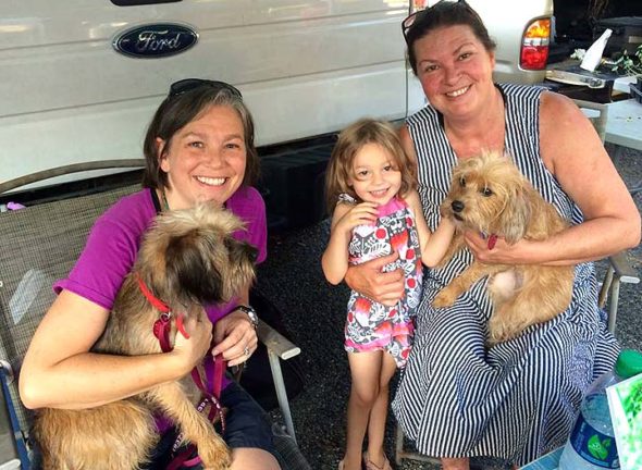 YS PetNet’s Kari Barnes, Faye Wheeler and LaVena Lichtenfels shared a tent with Hansel and Gretel at a recent farmers’ market. PetNet is a local collective of animal foster homes for stray and abandoned cats and dogs. The terriers are two of the animals currently looking for a loving family. To date, the group has successfully found homes for 11 strays, and reunited three dogs with their owners. (Submitted Photo)