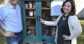 Kimberly Horn with husband, Kriston, standing by the new Free Little Pantry on Walnut Street. (submitted photo)