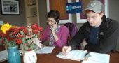 Clinton campaign volunteers Luan Heit and Nick Barton of Xenia were among about 11 volunteers making get-out-the vote phone calls for their candidate last week. Organizers say several hundred villagers have volunteered for the campaign. (Photo by Diane Chiddister)