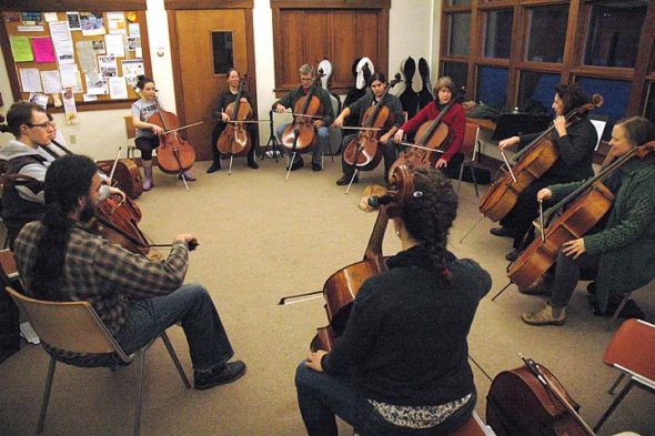 An informal cello technique forum at the Rockford Chapel social room on Monday evening. (photo by Matt Minde)