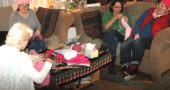 From left, Linda Sikes, Eve Fleck, Kate Mooneyham and Katie Rose Wright gathered Monday evening at Fleck’s home to crochet and knit pink, cat-eared “pussy” hats for participants in the Women’s March on Washington, Jan. 21, to wear. The women are participating in the Pussyhat Project, a national initiative tied to the march. Local resident Annie Blanchard is set to host several other hat-making gatherings at the Emporium at 10 a.m. Wednesday, Jan. 11, and Friday, Jan. 13. (Photo by Carol Simmons)