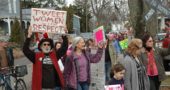 The Yellow Springs Sister March drew at least 250 villagers on Saturday, many expressing positive, pro-women messages, some of them playful. The local march was organized by local seventh-graders Carina Basora and Ava Schell. (Photo by Audrey Hackett)