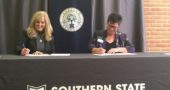 In December, Antioch University Midwest announced a partnership with Southern State Community College in November that allows students to earn associate’s and bachelor’s degrees in four years while saving on tuition costs. Nicole Roades, Southern State’s vice president of academic affairs, pictured left, and AUM Provost Marian Glancy signed the partnership agreement at a press conference. (Submitted Photo)