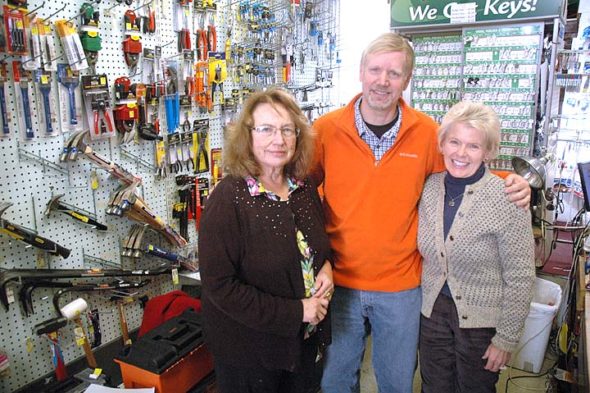 Yellow Springs has had the same hardware more than 90 years, yet it has changed hands only three times. Kathy Macklemore, left, who has managed the store for 16 years, is pictured here with the new owners of Yellow Springs Hardware, Shep Anderson and Gilah Pomeranz. The couple took over at the beginning of January, though Macklemore will stay on as manager. (Photo by Matt Minde)