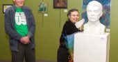 Sculptor Brian Maughan watched as Gallery Coordinator Nancy Mellon unveiled his new work, a bust of Gaunt. The sculpture was added to the YS Arts Council’s permanent collection. (Submitted photo)