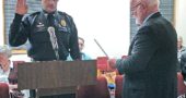 At Council’s Feb. 6 meeting, Mayor David Foubert swore in Brian Carlson as the new Yellow Springs Interim Police Chief. (Submitted photo by Brian Housh)