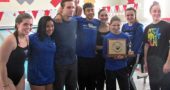From left: YSHS Bulldog swimmers Hailey Smith, Sara Zendlovitz, Tristan Giardullo, Olivia Chick, David Walker, Eden Spriggs, Jude Meekin, Lauryn DeWine and Hannah Morrison celebrate the girls’ team’s recent Metro Buckeye Conference championship, celebrating their second year in a row as conference champs. (Submitted photo)