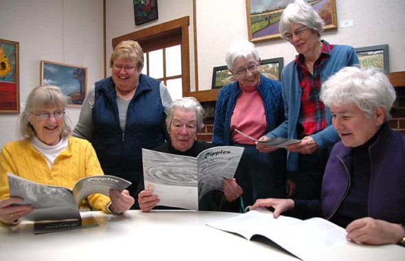 The YS Senior Center received a grant to support its publication of Ripples, the center's annual elder literary journal. Shown looking at past issues of Ripples are, from left, Suzanne Patterson, Karen Wolford, Jane Baker, Fran LaSalle, Marianne Whelchel and Lee Huntington. Not pictured is committee member Sandy Love. (Photo by Diane Chiddister)