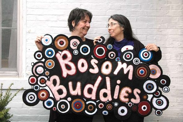 A new Yellow Springs Arts Council show, “Bosom Buddies,” opens on Friday, April 21, with a reception from 6 to 9 p.m. The show was inspired by the art created by Corrine Bayraktaroglu and friends during her bout with cancer. Other community members are invited to submit to the show art that’s linked to breast cancer. Shown above are Bayraktaroglu and her good friend, Nancy Mellon, who together are known as the JafaGirls. (Photo by Carol Simmons)