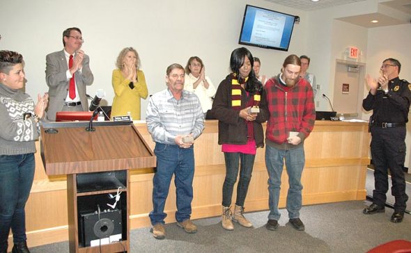 Onica-Elizabeth Garrett and William Dyke, of Yellow Springs, along with Randy Cardwell, of Xenia, were recognized by Yellow Springs police for their heroism. (photo by Diane Chiddister)