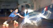 Shaylee Smith rolls with light ghosts, an artifact of the photo time exposure and disco lighting. (Photos by Matt Minde)