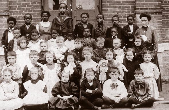 Yellow Springs schoolchildren were photographed in 1905 on the steps of the Union School House, one of the region’s earliest integrated schools. The “Blacks in Yellow Springs” encyclopedia includes an entry on the village’s rich tradition of black leadership in local schools. (Submitted photo courtesy of Yellow Springs Historical Society)