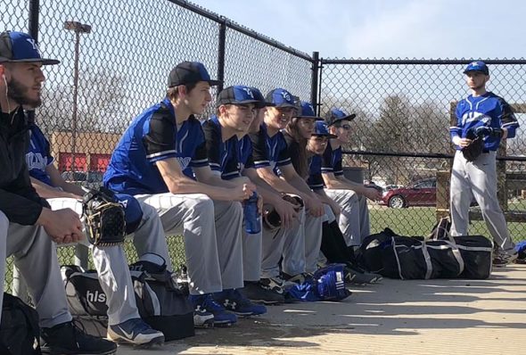 Members of the YSHS varsity baseball team are all smiles before the start of the April 12 game at Belmont High School. The Bulldogs would go on to win the game 13-5. Pictured left to right are Tony Marinelli, Dylan Rainey, Colton Bittner, Eric Romohr, Trey Anderson, Jasiah Zinger-Mitchell, Eli Cordell, Travis Scarfpin and Donnie Isenbarger. (Submitted photo by Eleanor Anderson)
