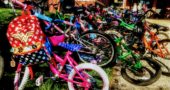 Bikes lined the sidewalks at Mills Lawn on May 9 for Bike to School Day, when Mayor Pam Conine made a proclamation in honor of the late Tracy Logan.