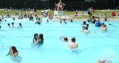 Several hundred villagers and out-of-towners converged on the Gaunt Park pool on Monday, a sweltering hot Memorial Day. The pool was recently upgraded with $80,000 worth of repairs, according to Village Public Works Director Johnnie Burns. The Yellow Springs pool is now the only operating municipal swimming pool in Greene County. (Photo by Diane Chiddister)