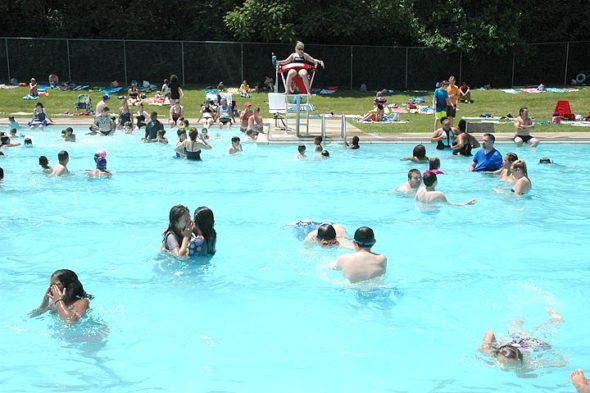 Several hundred villagers and out-of-towners converged on the Gaunt Park pool on Monday, a sweltering hot Memorial Day. The pool was recently upgraded with $80,000 worth of repairs, according to Village Public Works Director Johnnie Burns. The Yellow Springs pool is now the only operating municipal swimming pool in Greene County. (Photo by Diane Chiddister)