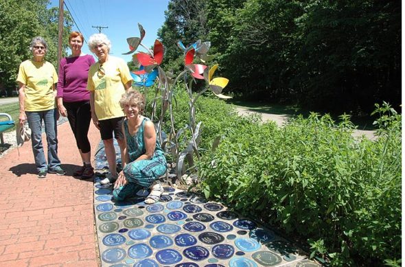 The 20th anniversary of the Women’s Park of Yellow Springs will be celebrated on Sunday, July 1, from 1 to 3 p.m. at the park on the Little Miami Trail bike path. Shown above are some of the park’s organizers and gardeners, including Evelyn LaMers, in front; behind, from left, Helen Eier, Deb Henderson and Macy Reynolds. (Photo by Diane Chiddister)