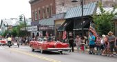 Nerak Roth Patterson parades his red convertible through downtown at 2018's Fourth of July parade (Photo by Diane Chiddister)