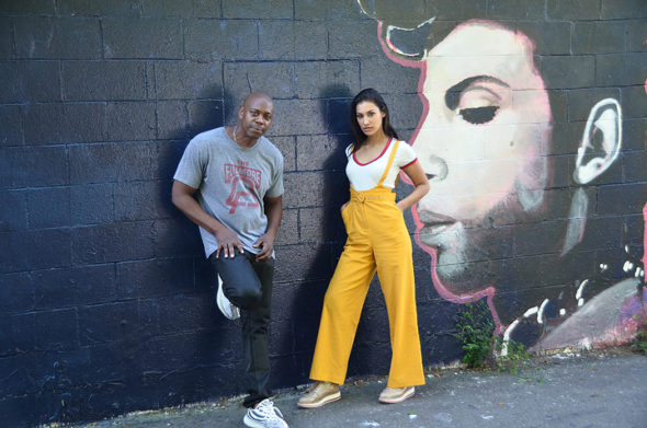 Before the screening of her new feature film “Blindspotting," at the Little Art Theatre, July 19, Actor Janina Gavankar and friend Dave Chappelle hung out in front of a mural of the musician Prince in Kieth’s alley by local artist Sarah Dickens. (Photo by Robert Hasek)
