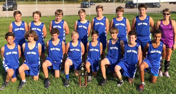 The 2018 McKinney boys cross-country team ran to victory at the Buck Creek Invitational. Proudly displaying the trophy are, front row, from left: Ben Espinosa, Samuel Trelawny-Cassity, Otto Cipollini, Josh Clark, Isaac Grushon, Jack Horvath, Dylon Mapes, Krishan Miller; Back row, from left: Liam McClean, Tallis Onfroy-Curley, Kael Cooney, Luka Sage-Frobotta, Ethan Knemeyer, Jason Knemeyer, JP Anderson and Head Coach Isabelle Dierauer. (Submitted photo)