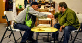 Robb Willoughby, left, and Troy Lindsey rehearse a tense scene from “Bro” over a pair of aging bananas in the Sunday school room at First Presbyterian Church. “Bro” is one of the short plays that will be performed as part of the YS Theater Company’s production of “W3 — Three Humorous Tales of Horror,” opening this weekend, Friday–Saturday, Oct. 26–27, at 8 p.m. and continuing the following weekend. (Photo by Lauren “Chuck” Shows)