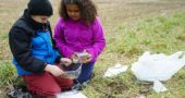 Mills Lawn third-graders Emery Fodal and Wyatt Fagan counted soil invertebrates using Berlese Funnels at Agraria last spring. They also kept data on soil temperature levels over a four-week period at the farm. (Submitted photo by Peg Morgan)