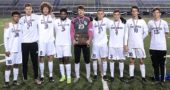 The Yellow Springs High School boys varsity soccer team’s seniors recently posed with their district runner-up medals and trophy. From left is David Walker, Calum Siler, Teymour Fultz, Tariq Mohammed, Dylan Rainey, Andrew Clark, Jesse Linkhart, Mateus Cussioli, and Ashton Gueth. The team had just lost a hard-fought match in the district finals, 6–4, on Oct. 25. (Submitted photo by Tracy Clark)