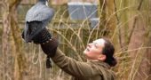 Rebecca Jaramilla, director of the Raptor Center at Glen Helen Nature Preserve, handled Velocity, a female peregrine falcon, during a raptor photography program at the center on Sunday, Feb. 24. (Photo by Luciana Lieff)