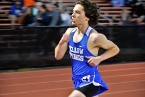 August Millman sprints for the YSHS team at last week’s Waynesville Invitational on Friday, April 12. (Photo by Kathleen Galarza)