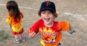 Nora Carr runs merrily off the field in full T-ball regalia at Perry League on Friday, June 21. (Submitted photo)