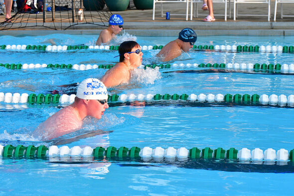 The Yellow Springs Sea Dogs competed against Forest Ridge at the championships at Greene Valley Pool on Thursday, July 22. Pictured are Stephen Dunn, foreground, and Luke Guisleman, farthest lane, competing in the boys 50-meter breast stroke. (Photo by Kathleen Galarza)