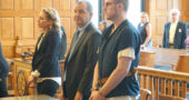 Zyrian Atha-Arnett stood with his defense lawyer, Jon Paul Rion, during his sentencing Wednesday, July 21, in the 2019 stabbing death of Leonid “Lonya” Clark. Atha-Arnett pleaded guilty to involuntary manslaughter as part of a plea deal with the Greene County Prosecutor’s Office, and was sentenced to 15 years in prison for that and other charges. (Photo by Carol Simmons)