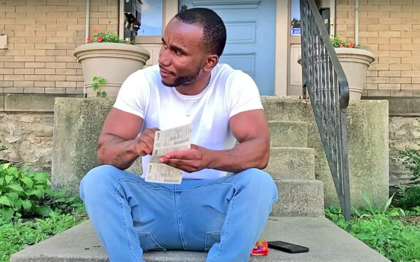 Local resident and hip-hop artist Tronee Threat, the performing name of Guy Banks, will perform as part of Thursday’s concert. He is pictured in Yellow Springs in a still from the recently released music video for his song “Die On Me.” (Music video still)