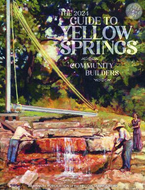 Ever in the spirit of tapping into the wealth of artistic talent in Yellow Springs, the News worked with local artist Travis Tarbox Hotaling to design the cover of this year's Guide. The subject of Hotaling's cover makes literal the "community builder" theme of this publication: it depicts the 1949 construction of the famed Yellow Spring in Glen Helen Nature Preserve. It shows builders Carmelo Ricciardi and Albert ­Williams placing massive limestone boulders around the spring to enhance the beauty and access of the naturally occurring feature. To the right is Louise Odiorne, a landscape architect who was tasked with the design of the spring.